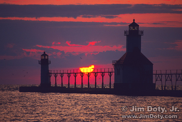 Sunset, St. Joseph Lighthouse, Michigan.. Photo copyright Jim Doty Jr.